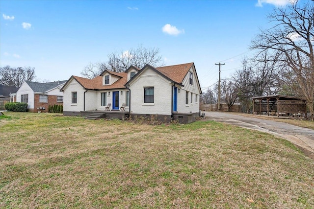 view of front of home with a front yard