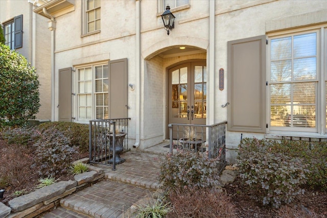 entrance to property featuring french doors