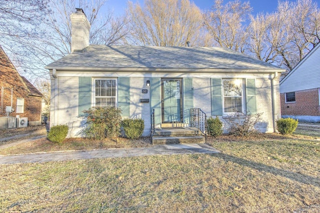 view of front of home with a front lawn