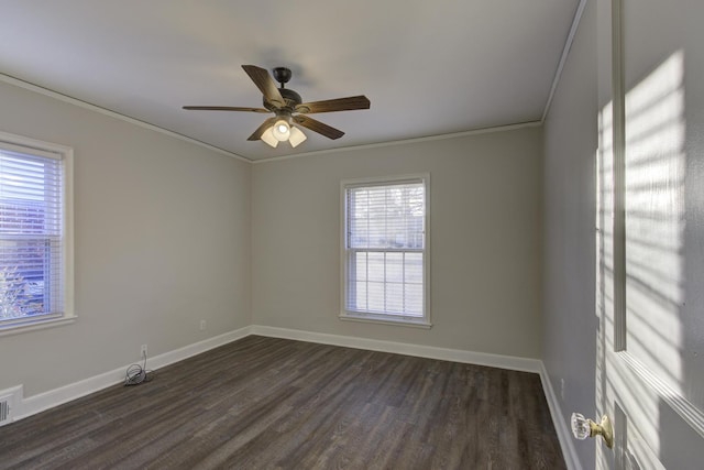 spare room with crown molding, ceiling fan, and dark hardwood / wood-style flooring