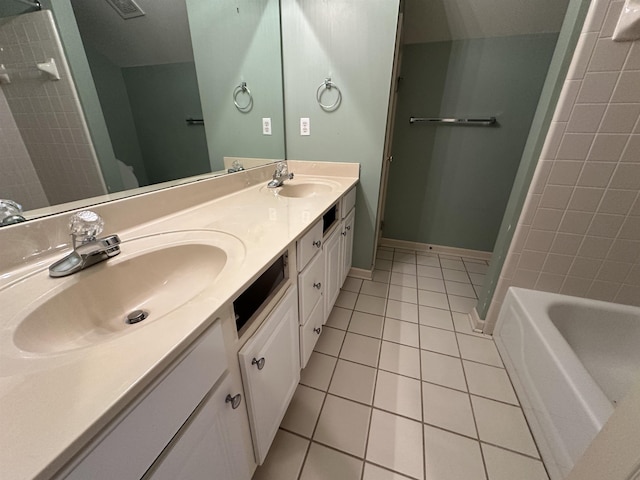 bathroom with tile patterned flooring and vanity