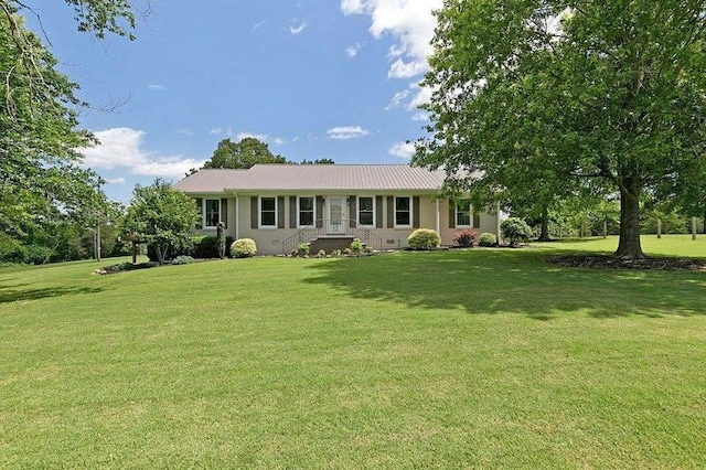 ranch-style home featuring a front yard