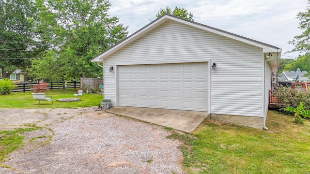 garage with a lawn