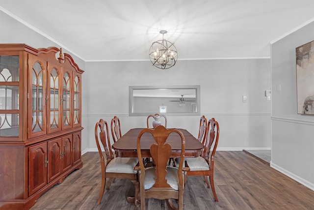 dining room featuring a notable chandelier, crown molding, and hardwood / wood-style flooring