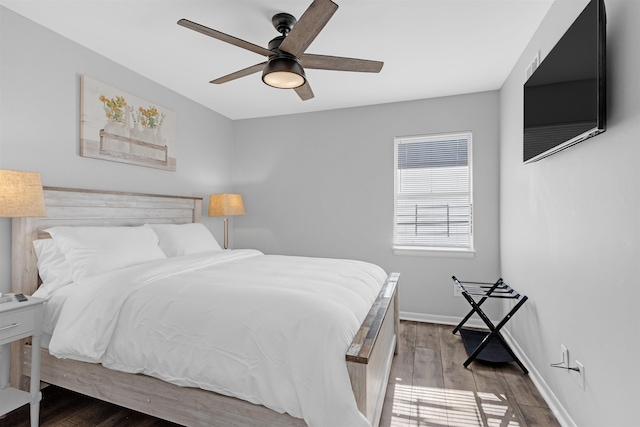 bedroom featuring wood-type flooring and ceiling fan