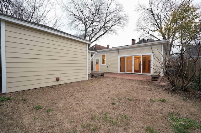 rear view of property with a patio