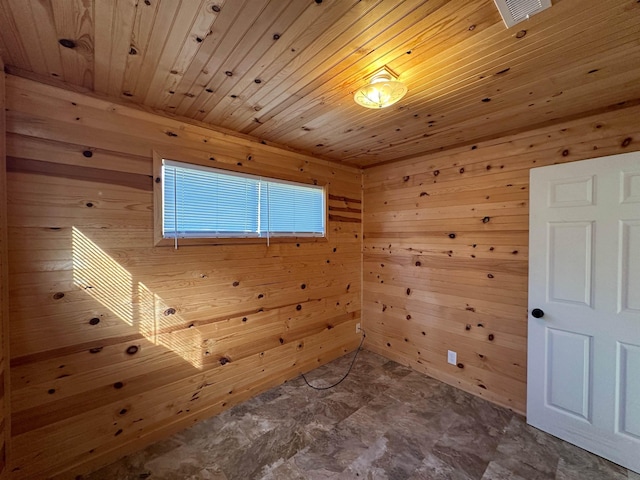 bonus room featuring wood ceiling and wood walls