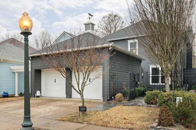 view of property exterior with a garage