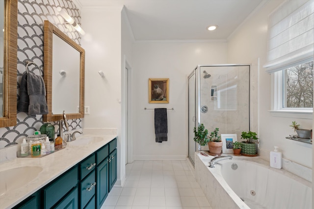 bathroom with tile patterned flooring, crown molding, shower with separate bathtub, and vanity