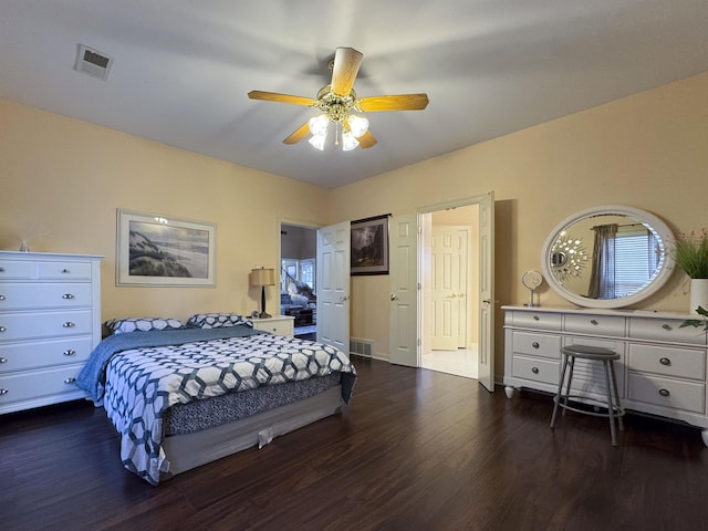 bedroom featuring dark hardwood / wood-style floors and ceiling fan