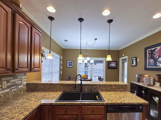 kitchen with stainless steel dishwasher, ornamental molding, sink, and hanging light fixtures