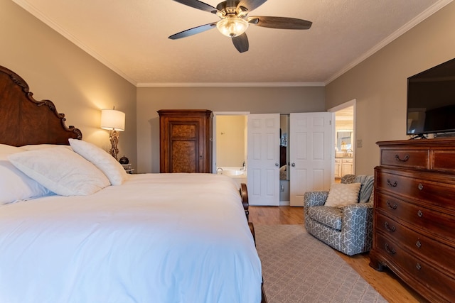 bedroom featuring ornamental molding, ceiling fan, and light hardwood / wood-style floors