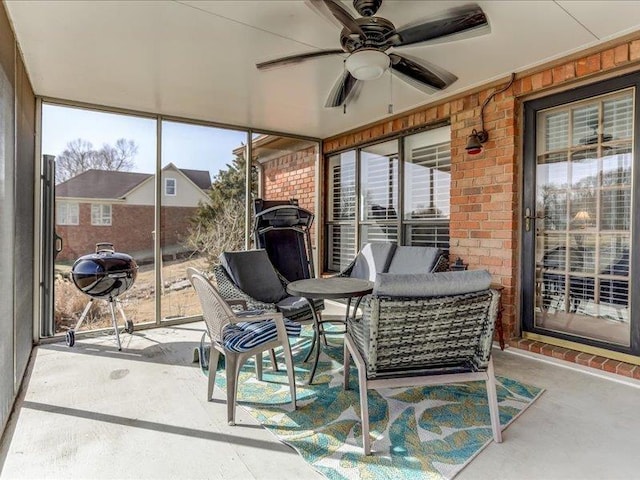 sunroom / solarium with ceiling fan