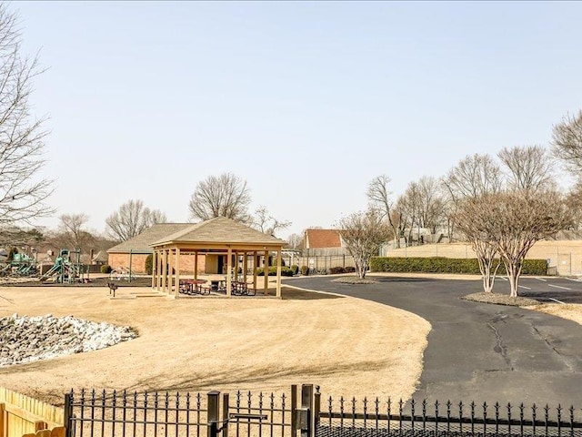 view of community with a playground and a gazebo