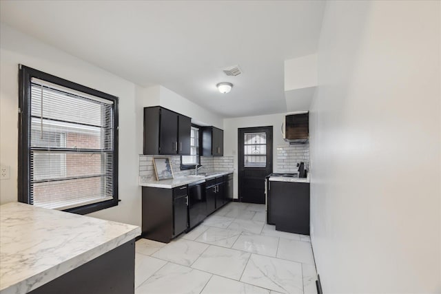 kitchen featuring electric range, sink, dishwasher, and tasteful backsplash