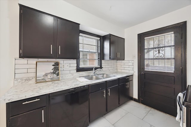 kitchen featuring range, dishwasher, dark brown cabinetry, backsplash, and sink