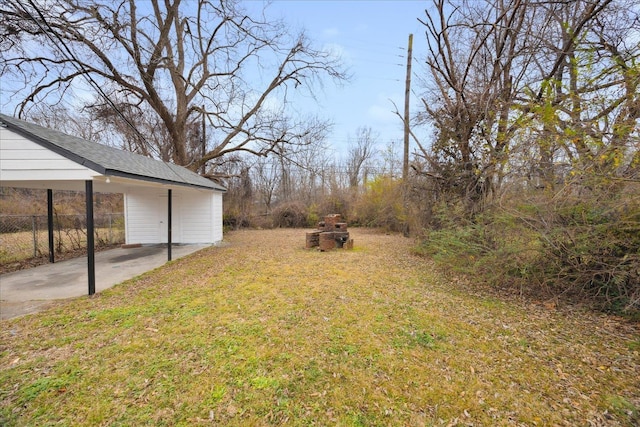 view of yard featuring a carport