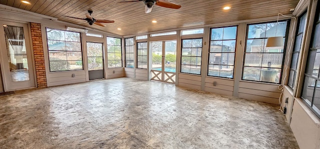 unfurnished sunroom with vaulted ceiling, wooden ceiling, and ceiling fan