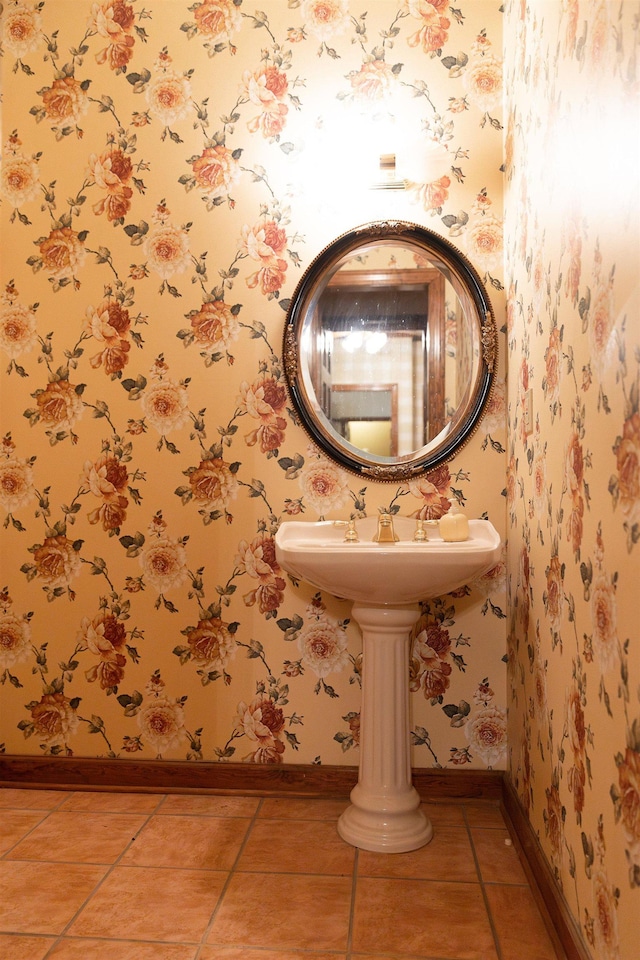 bathroom with tile patterned floors