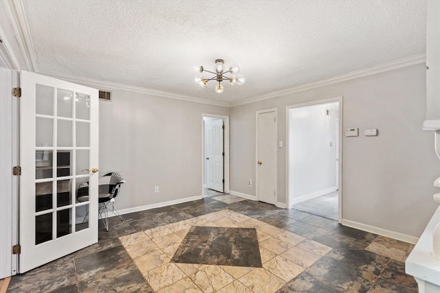 interior space with a notable chandelier, ornamental molding, and a textured ceiling