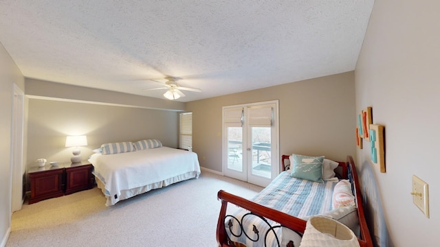 carpeted bedroom featuring ceiling fan, a textured ceiling, and access to outside