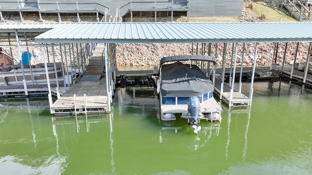 dock area featuring a water view