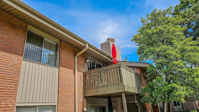 view of property exterior with a balcony