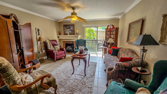 living room featuring a brick fireplace, light tile patterned floors, ornamental molding, and a textured ceiling