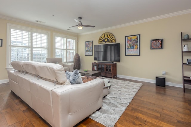 living room featuring crown molding, ceiling fan, and dark hardwood / wood-style floors