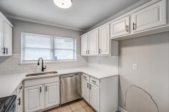 kitchen with tasteful backsplash, dishwasher, sink, and white cabinets