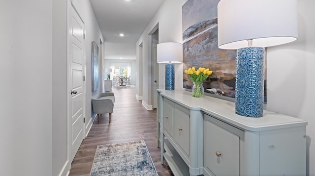 hall featuring dark wood-type flooring