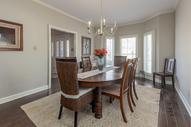 dining space featuring crown molding, a notable chandelier, and dark hardwood / wood-style flooring