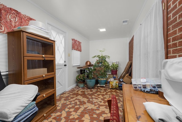 interior space with crown molding