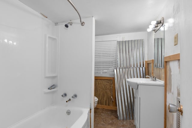 full bathroom featuring vanity, shower / washtub combination, and toilet