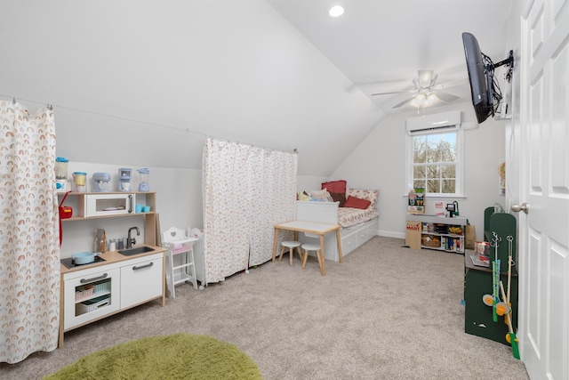 bedroom featuring vaulted ceiling, sink, light colored carpet, ceiling fan, and a wall unit AC