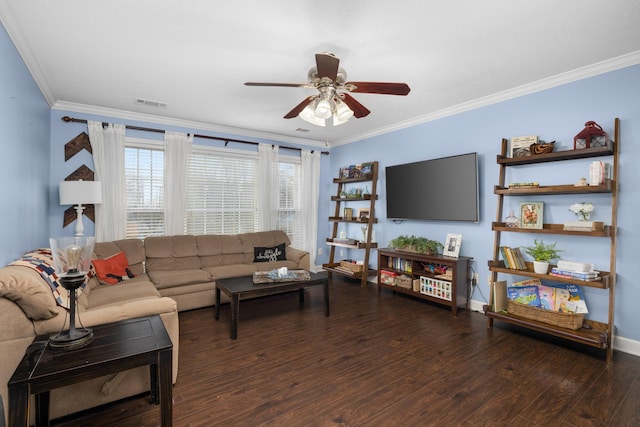 living room featuring dark hardwood / wood-style flooring, ornamental molding, and ceiling fan