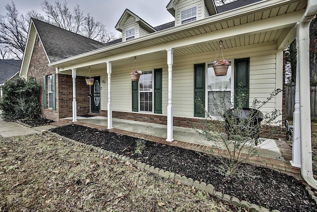 view of home's exterior with covered porch