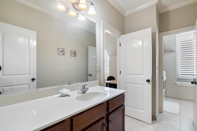 bathroom with tile patterned flooring, ornamental molding, and vanity