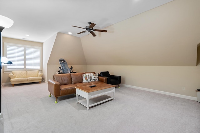 living room with vaulted ceiling, light carpet, and ceiling fan