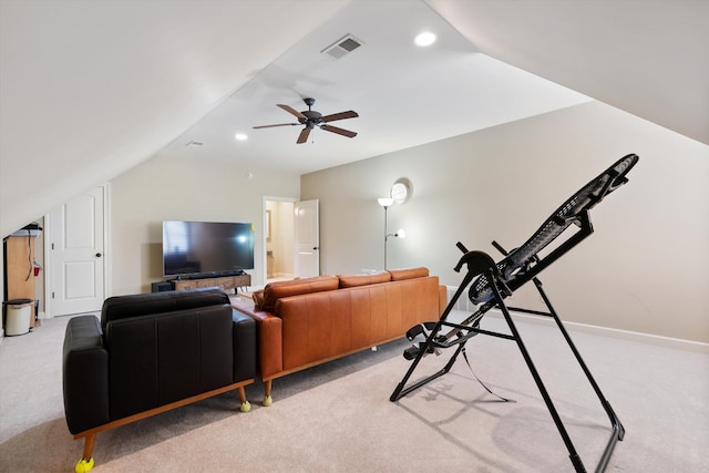 living room featuring lofted ceiling, light colored carpet, and ceiling fan