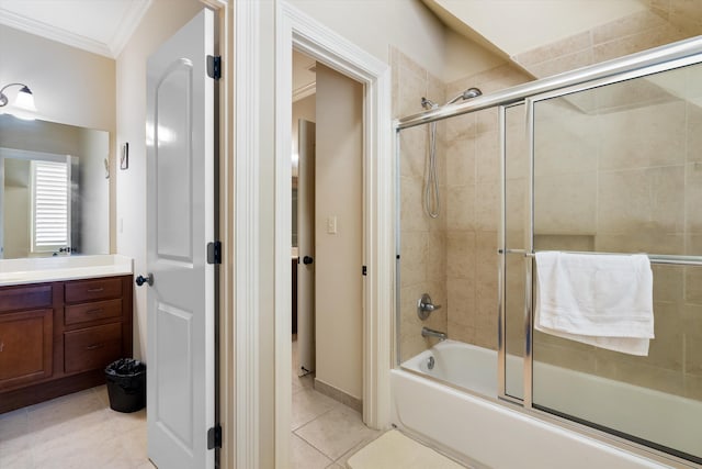 bathroom featuring vanity, crown molding, tile patterned floors, and combined bath / shower with glass door