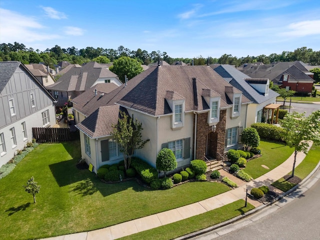 view of front of property with a front lawn