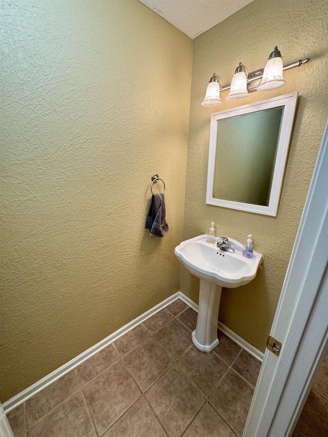 bathroom with tile patterned flooring