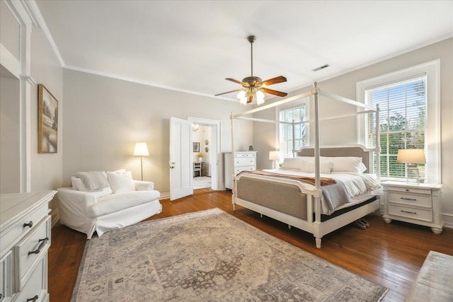 bedroom featuring crown molding, ceiling fan, and dark hardwood / wood-style flooring