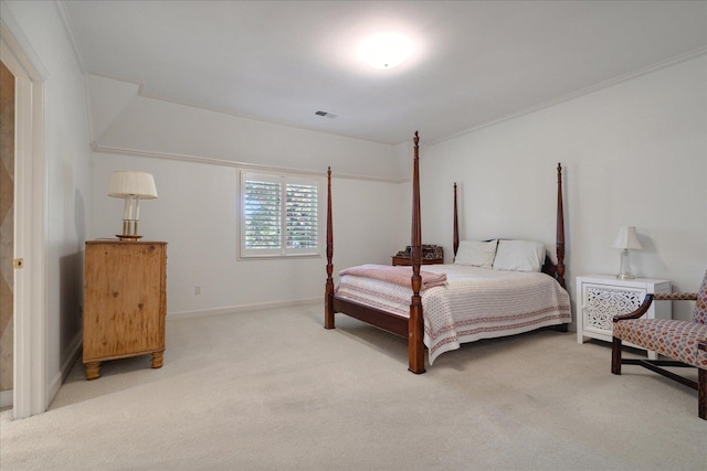 bedroom featuring ornamental molding and light carpet