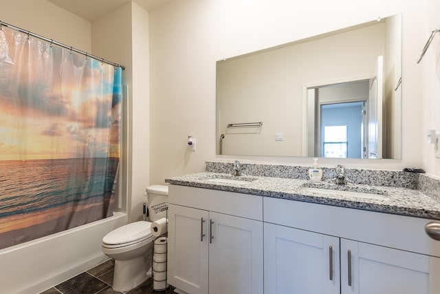 full bathroom featuring shower / bath combination with curtain, tile patterned floors, vanity, and toilet