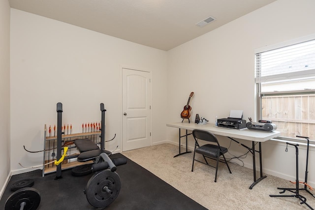 interior space featuring light colored carpet