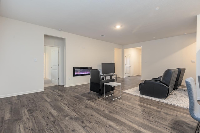 living room featuring dark hardwood / wood-style floors