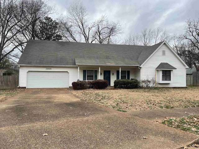 single story home featuring a garage