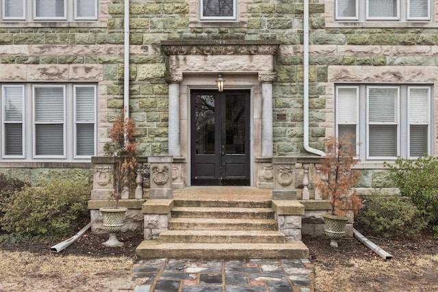 entrance to property featuring french doors